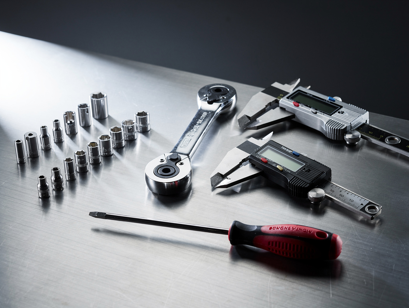 Close-up of professional mechanic tools on mobile cart